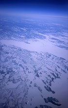 CANADA, Newfoundland, Aerial view of snow covered tundra from plane