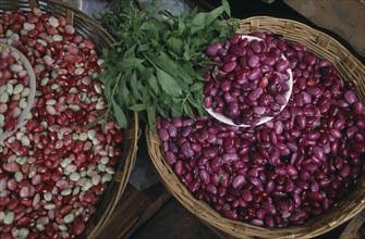 MEXICO, Chiapas, San Cristobal de Las Casas, "Pink, white and red shelled beans displayed in