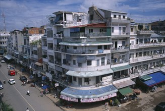 CAMBODIA, Phnom Penh, "City view over converging streets, one well maintained and the other partly