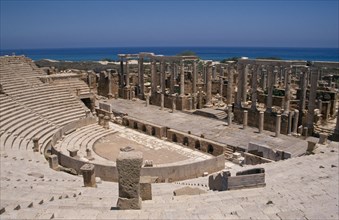 LIBYA, Tripolitania, Leptis Magna, View over Roman amphitheatre towards the Mediterranean Sea