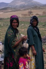 IRAN, Zagros Mountains, "Qashqai nomads on annual immigration through the Zagros Mountains.  Two