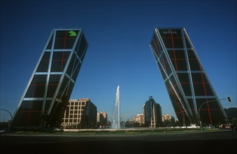 SPAIN, Madrid, Paseo de La Castellana. Puerta de Europa office complex at entrance to business
