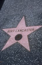 USA, Florida, Orlando, Universal Studios. Close up of Burt Lancaster Star marble pathing slab.