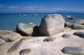 MALAYSIA, Penang, Batu Ferringhi, "Beach and large, smooth rocks with sea beyond."