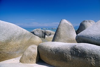 MALAYSIA, Penang, Batu Ferringhi, "Beach with close view of large, smooth rocks."