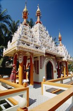 MALAYSIA, Penang, Georgetown, Dharmikarama Burmese Temple.  Exterior with ornate carved roof and