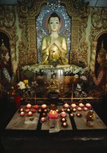 MALAYSIA, Penang, Georgetown, Dharmikarama Burmese Temple.  Interior with pink lotus flower shaped