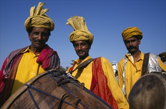 PAKISTAN, Punjab, Lahore, Portrait of three drummers