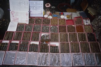 KOREA, South, Chejudo Island, "Dried centipedes, reptiles and other insects on sale in a street