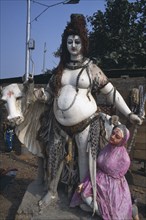 INDIA, West Bengal, Calcutta, "Statue of Shiva and his vehicle the bull, Nandi."