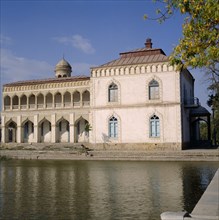 UZBEKISTAN , Bukhara, The Summer Palace. The harem building with bathing pool in foreground