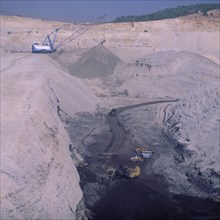 TURKEY, Yatagan, "Opencast coal mine, deep quarry, loaded trucks, working crane "