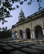 BANGLADESH, Dhaka, Armenian church of Holy Resurrection and rows of identical graves