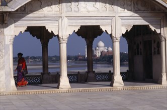 INDIA, Uttar Pradesh, Agra, "View towards the Taj Mahal seen through covered, colonnaded walkway