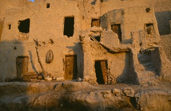 EGYPT, Western Desert, Siwa Oasis, Shali Fortress detail of old mud houses at sunrise