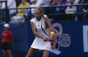 20002124 SPORT Tennis Women s Anna Kournikova at Wimbledon 2000  about to hit a ball