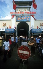VIETNAM, Ho Chi Minh City, "Main entrance to Ben Thanh Market, part view of belfry and clock,