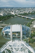 ENGLAND, London, British Airways London Eye Milennium wheel capsule and skyline