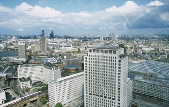 ENGLAND, London, View over the skyline toward Canary Wharf from the London Eye.