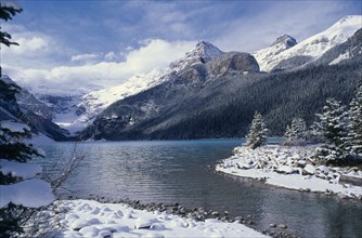 CANADA, Alberta, Banff National Park, Lake Louise and surrounding landscape after snowfall.