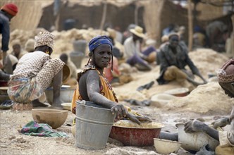 BURKINA FASO, Sahel, Women panning for gold