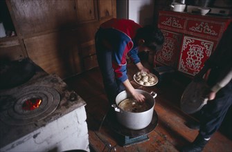MONGOLIA, People, Cooking Buuz steamed minced lamb dumplings.