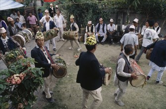 NEPAL, Dharan Bazaar, Musicians at a traditional Limbu wedding