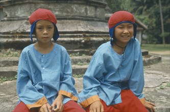 LAOS, Luang Prabang, Two boys in traditional dress for new year