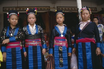 LAOS, Luang Prabang, Four Hmong women in traditional dress