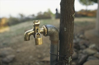 ENVIRONMENT, Water, Water tap with padlock fixed to it in Baruyu Village school Kenya