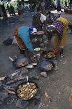 NIGERIA, Abuja, Cooking food at Dikko market