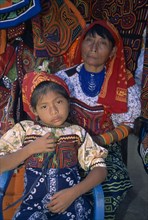 PANAMA, San Blas Islands, Portrait of a Cuna Indian woman and young girl