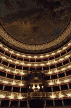ITALY, Campania, Naples, Teatro San Carlo opera house interior with painted ceiling and ornate