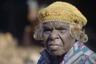 AUSTRALIA, South Australia, Oak Valley, Head and shoulders portrait of Aboriginal woman.