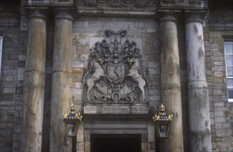 SCOTLAND, Lothian, Edinburgh, Holyrood Palace with Royal crest above the entrance