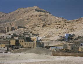 EGYPT, Nile Valley, Thebes, The Ramesseum. View of  Tombs of the nobles in hillside opposite the