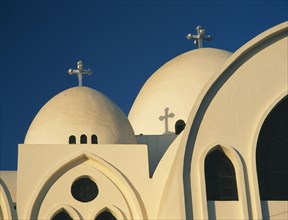 EGYPT, Nile Valley, Aswan, The Coptic Catherdral. View of roofscape in morning light.