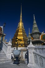 THAILAND, Bangkok, Grand Palace. Pillars and steps surrounding the building at The Royal Pantheon