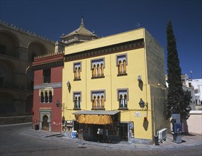 SPAIN, Andalucia, Cordoba, Colourful building beside the Mezquita