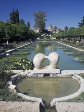 SPAIN, Andalucia, Cordoba, Alcazar de los Reyes Cristianos and its gardens with large pond and