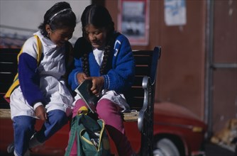 20037684 BOLIVIA  Potosi School girls share their homework.