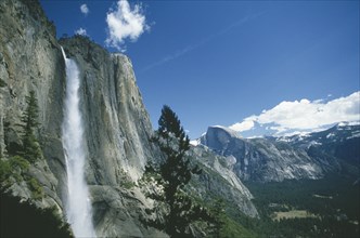 USA, California, Yosemite Nat. Park, Upper Yosemite Falls cascading over granite valley walls.