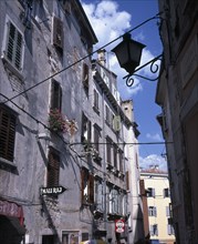 CROATIA, Rovinj, Cafe and bar signs in Old town street