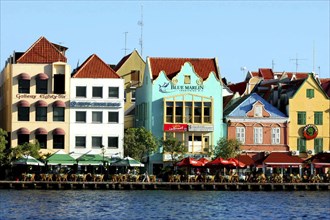 WEST INDIES, Dutch Antilles, Curacao, Old Willemstad. Row of brightly painted waterfront