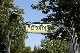 FRANCE, Ile de France, Paris, Art Nouveau style Metropolitan sign in green wrought iron