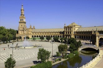 SPAIN, Andalucia, Seville, Plaza de Espana. View over the semicircular plaza