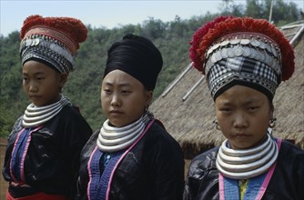 MYANMAR, People, Meo women wearing head dresses decorated with silver coins to indicate wealth.