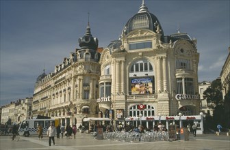 FRANCE, Languedoc, Montpellier, Place de le Comedie with tables and chairs outside