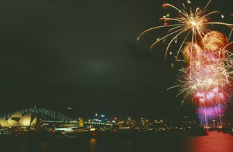 AUSTRALIA, New South Wales, Sydney, New Years fireworks display over Sydney Harbour with the Opera