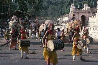 SRI LANKA, Kandy, Festival procession with musicians and elephants